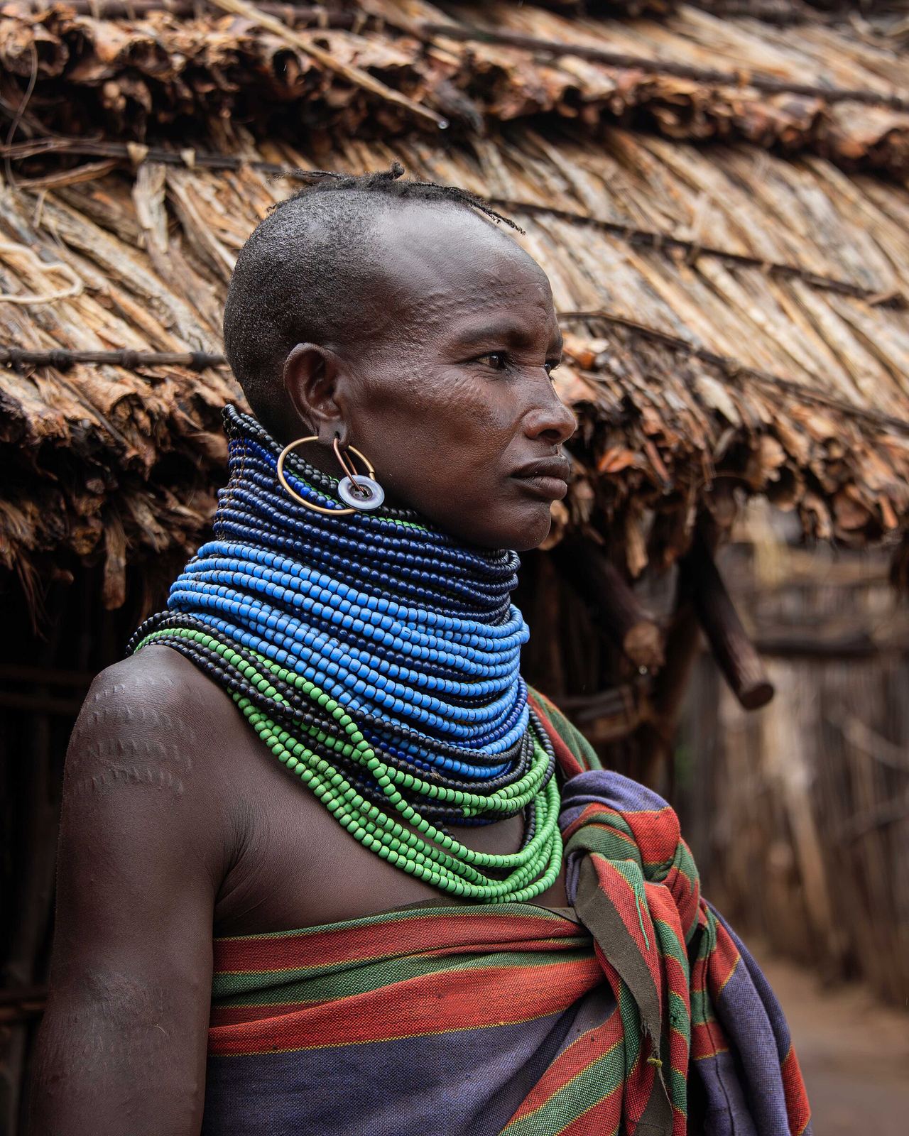A Turkana woman outside her home